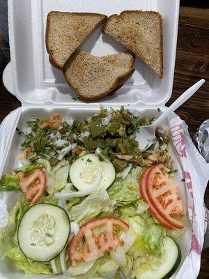 Nopales salad with an unnecessary lettuce salad. Just serve the nopales, cilantro, tomatoes and onions please.