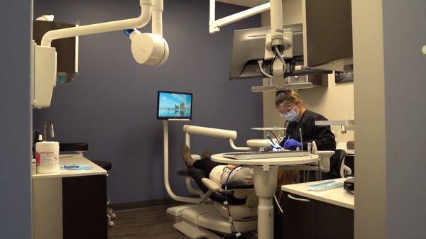 Dental hygienist at work at Witer Family Dentistry Washington MI