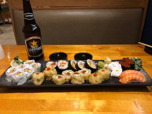 L to R: Philadelphia maki, Crazy maki (top), Las Vegas maki (bottom), ikura (salmon roe) nigiri, and salmon nigiri