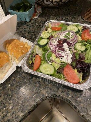 Greek salad w a side of fresh Italian bread