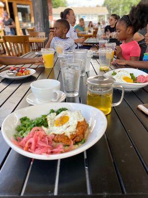 Fried chicken over grits with pickled onion and kale. With green tea.