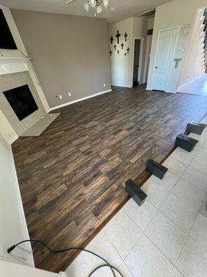 Check out this laminte flooring for our happy customer in their condo located in Houston, Texas