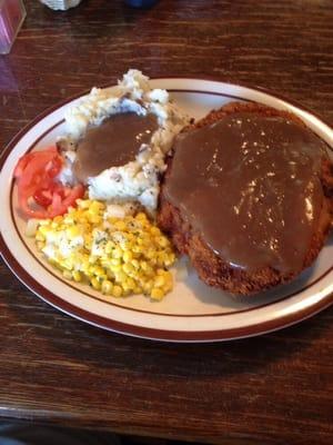 Chicken fried steak with brown gravy.. Delicious and HUGE!