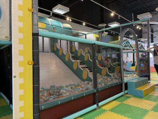 Slide area with ball pit.