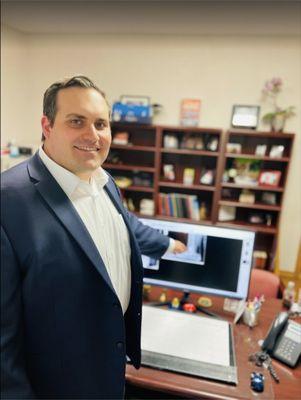 Dr. Haddad at his desk