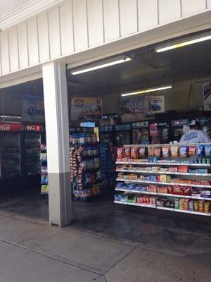 Plenty of coolers with cold drinks, ice, and snacks