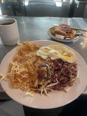 Home made corned beef and hash, eggs over medium.