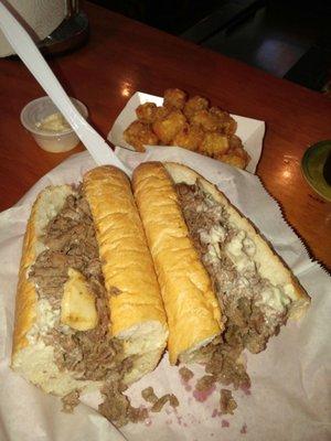 A really good cheesesteak. Large with mushrooms and a side of tots. Great deal. Super food.