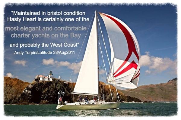 Hasty Heart sails past Point Bonita Lighthouse on her way into the San Francisco Bay with a quote from Latitude 38.