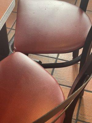 Table crumbs just wiped into chairs