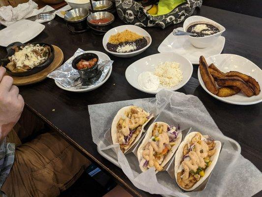 Plantains (right), fish tacos