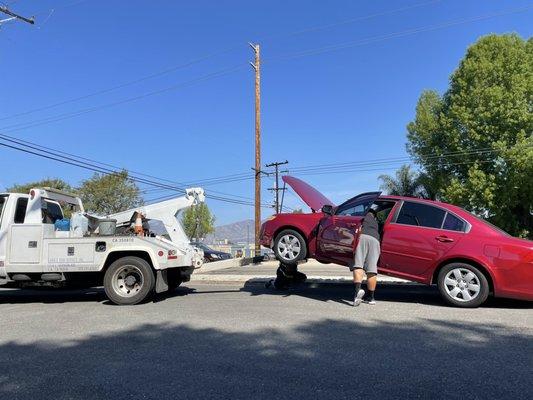 This is Kenny looking under the car trying to help me find the problem to my car!