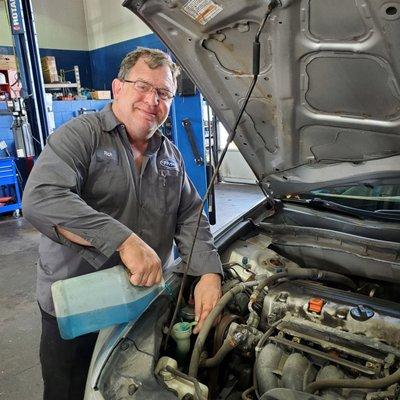 59 Auto Repair adds washer fluid