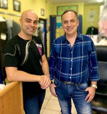 Marios (left) and John (right),  tailors at John's Cleaners and Tailors.