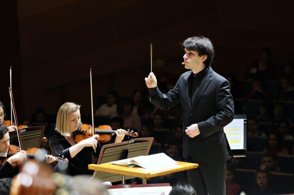 Associate Conductor Aram Demirjian conducts Pops, Family, Classics Uncorked, Education & special concerts. Photo: Cat Szalkowski