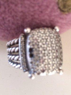 David Yurman ring with missing diamonds. Check reviews on the internet this is very common