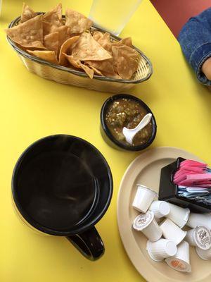 Cup of coffee and chips & salsa