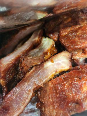 Raw ribs being sold as cooked in the hot deli area.