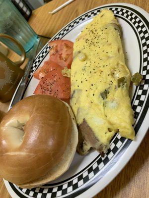 Moms veggie omelet with bagel and tomato