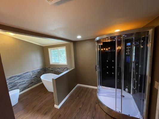 Steam shower and free standing tub. Complete bath renovation by Jd general construction.