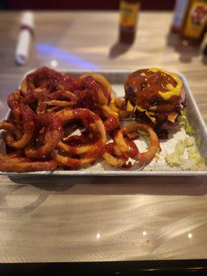 Onion rings with the 2 gunz special....burger with sauces