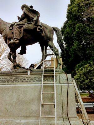 Restorer Jason Jones working in the State Capital Salem brazing the horses leg of the monument Circuit Rider.