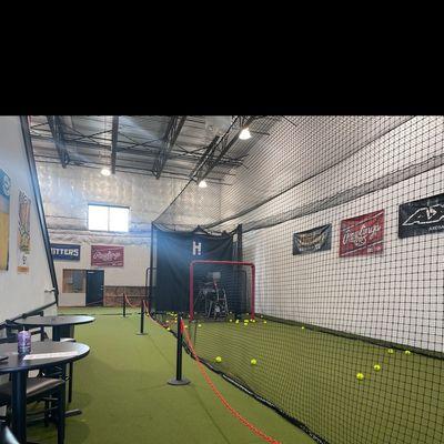 Two batting cages that can do fast pitch and slow pitch baseball and softball. Also adult beverages and small eats.