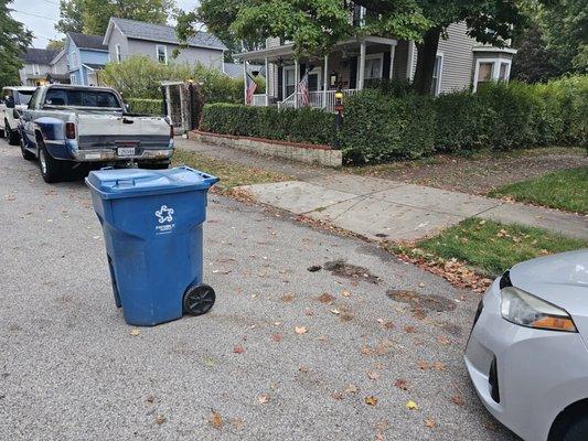 Wow that car is really blocking the whole curb... that's ok just leave the can in the middle of the road idiot.