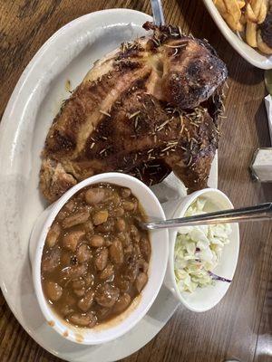 Baked half chicken, coleslaw and pinto beans