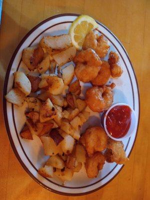 Fried shrimp with home fries