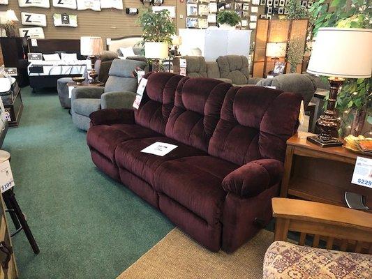 Motion Sofa in a beautiful Burgundy fabric.