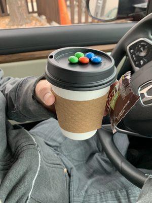 M&M's with her hot chocolate