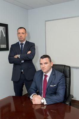 Alex Umansky and Yuriy Moshes of Law Office of Yuriy Moshes, P.C.