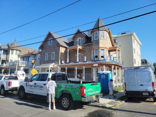 Our dedicated workers at a beautiful shore house preforming insulation installations