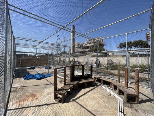 12' tall chain link roof enclosure for the wetlands and wildlife center in Huntington Beach,CA