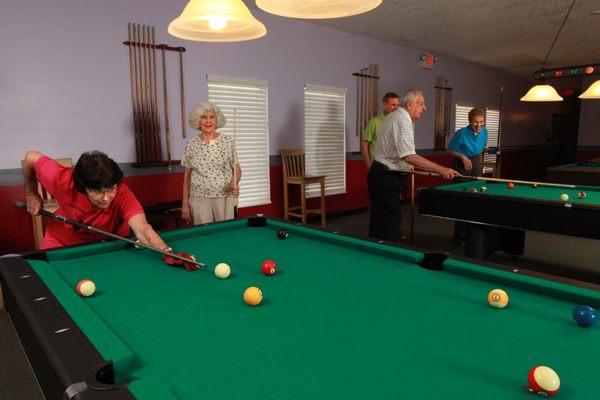 The billiards room is a great place to relax and make new friends.