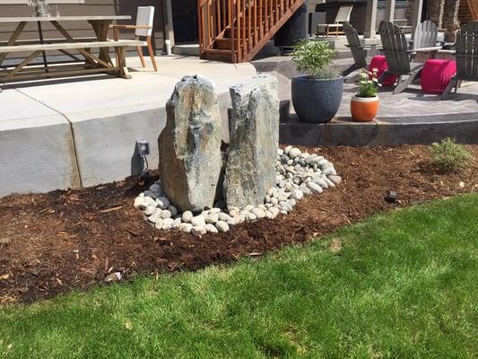 Core drilled boulders as fountains