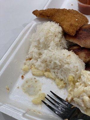 The burnt plastic box for the #4 Seafood Mix Lunch $11.29. The fried seafood was on top of that spot