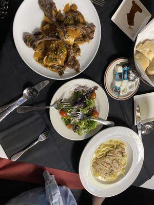 Fettuccine Alfredo, lamb chop special, and salad and bread