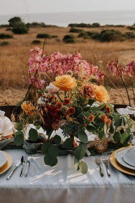 beautiful centerpieces with naked lady flowers and the bluffs near fort bragg