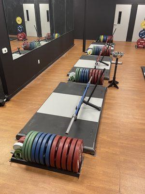 Eleiko deadlift platforms, bumper, plates and bars.