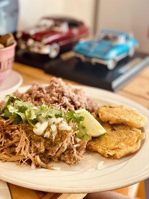 Shredded Mojo pork with tostones and rice and beans (gallo pinto)