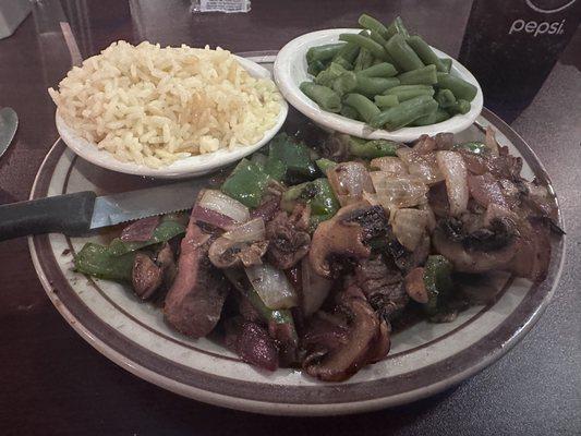 7oz sirloin au jus, pilaf rice and green beans.