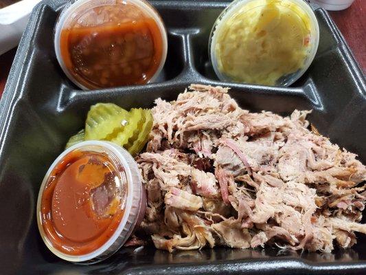 Pork plate with baked beans and potato salad