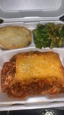 Homemade lasagna with fresh broccoli &Garlic Bread