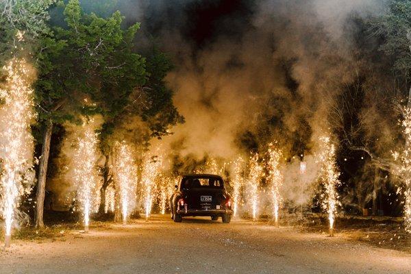 Sending off the newlyweds in a shower of golden fountains, courtesy of Liberty Fireworks & Pyrotechnics. Wishing them a lifetime of love!