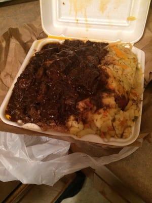 Oxtails ... Gravy on my rice per my request!! Tender and delicious