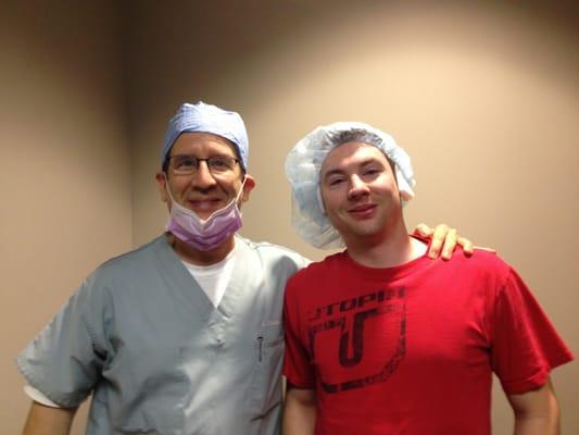 Dr. Barcácel with a happy LASIK patient, who just got rid of his glasses and contacts