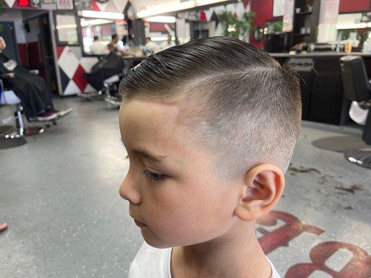 Little man's first time at the barber