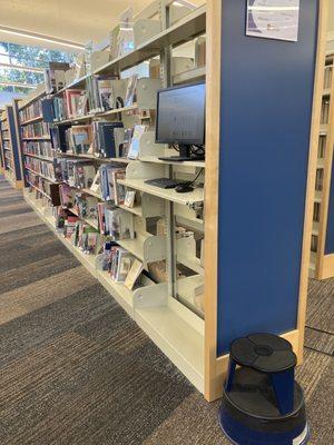 Computer access to search the catalog on the floor amongst books, very convenient